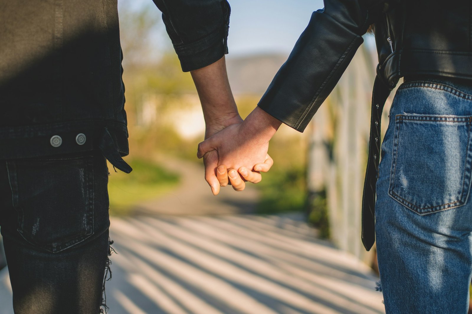 Young couple in love holding hands